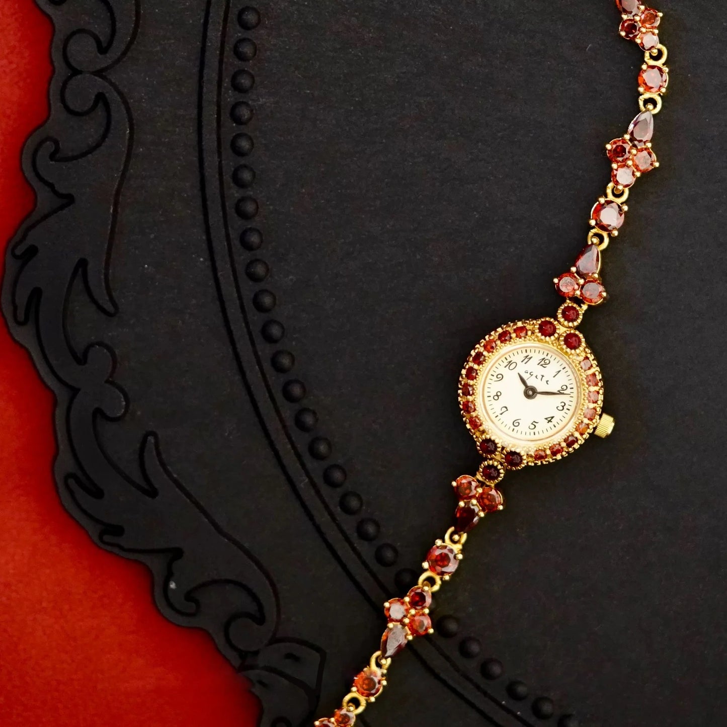 Red Crystal-Embellished Gold Women’s Watch